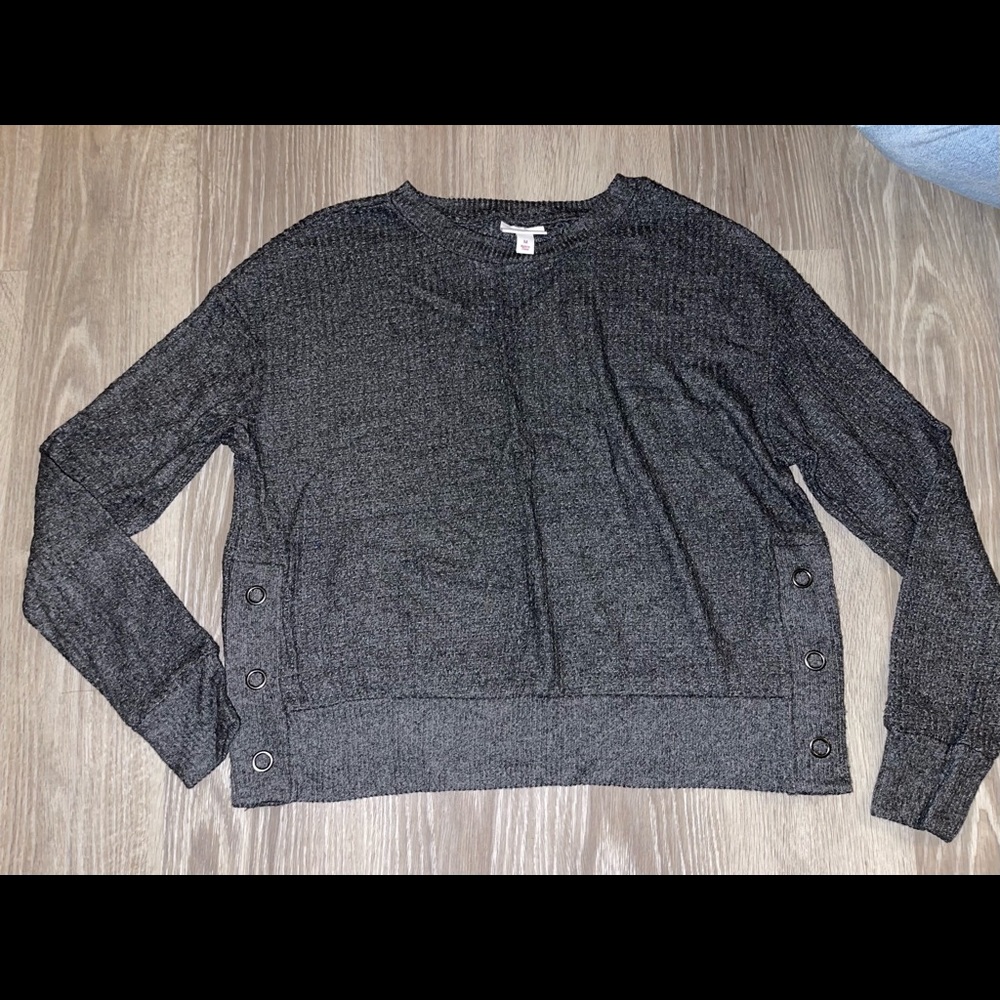 dark gray lounge top with snap buttons on sides
